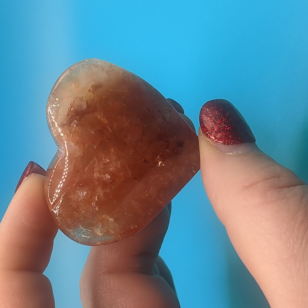 Rainbow filled red fire quartz heart